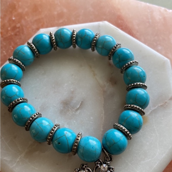 Turquoise bracelet with cross charm - Picture 4 of 5